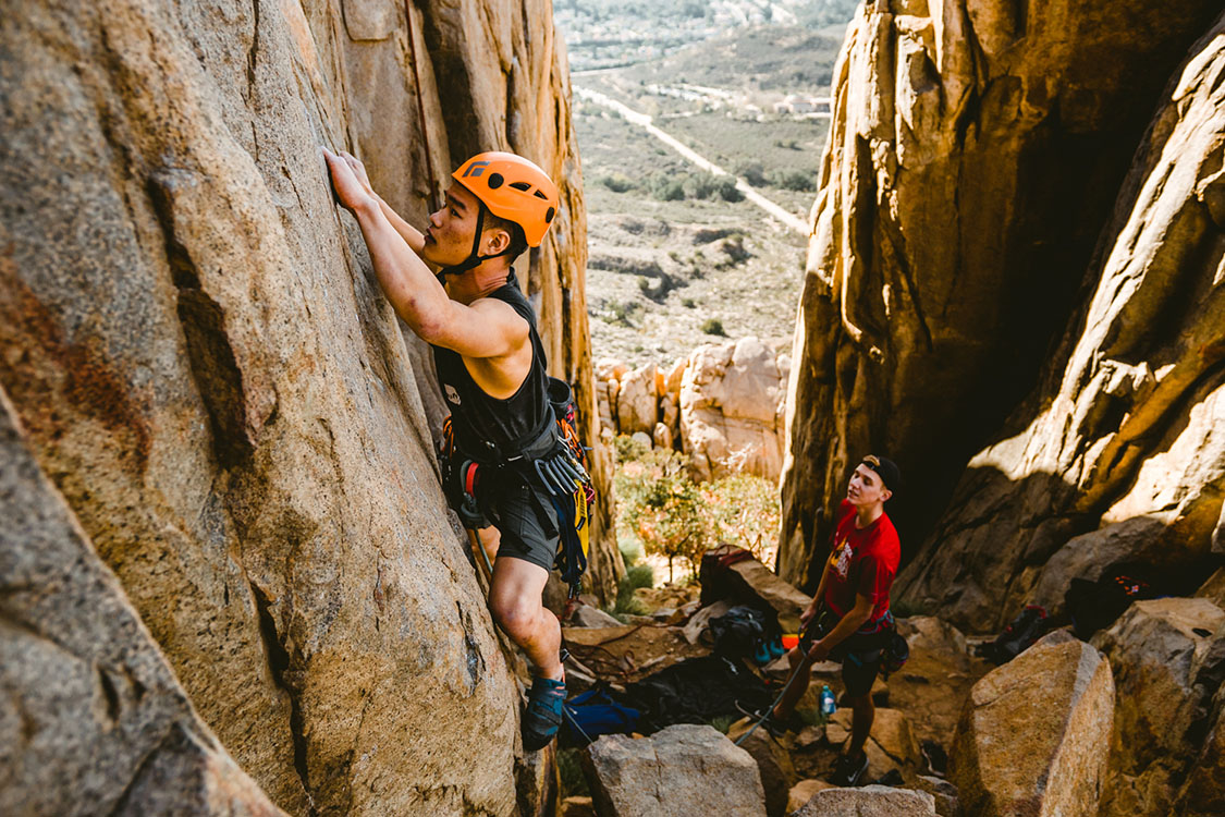 Man rock climbing with belayer in Mission Trails Regional Park